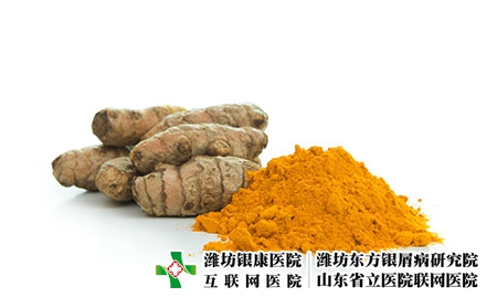摄图网_503641087_一堆姜黄粉与新鲜姜黄根（企业商用）